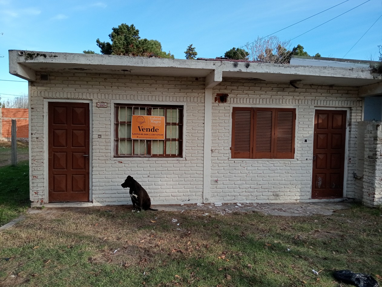 Casa, departamentos y lote a la venta 