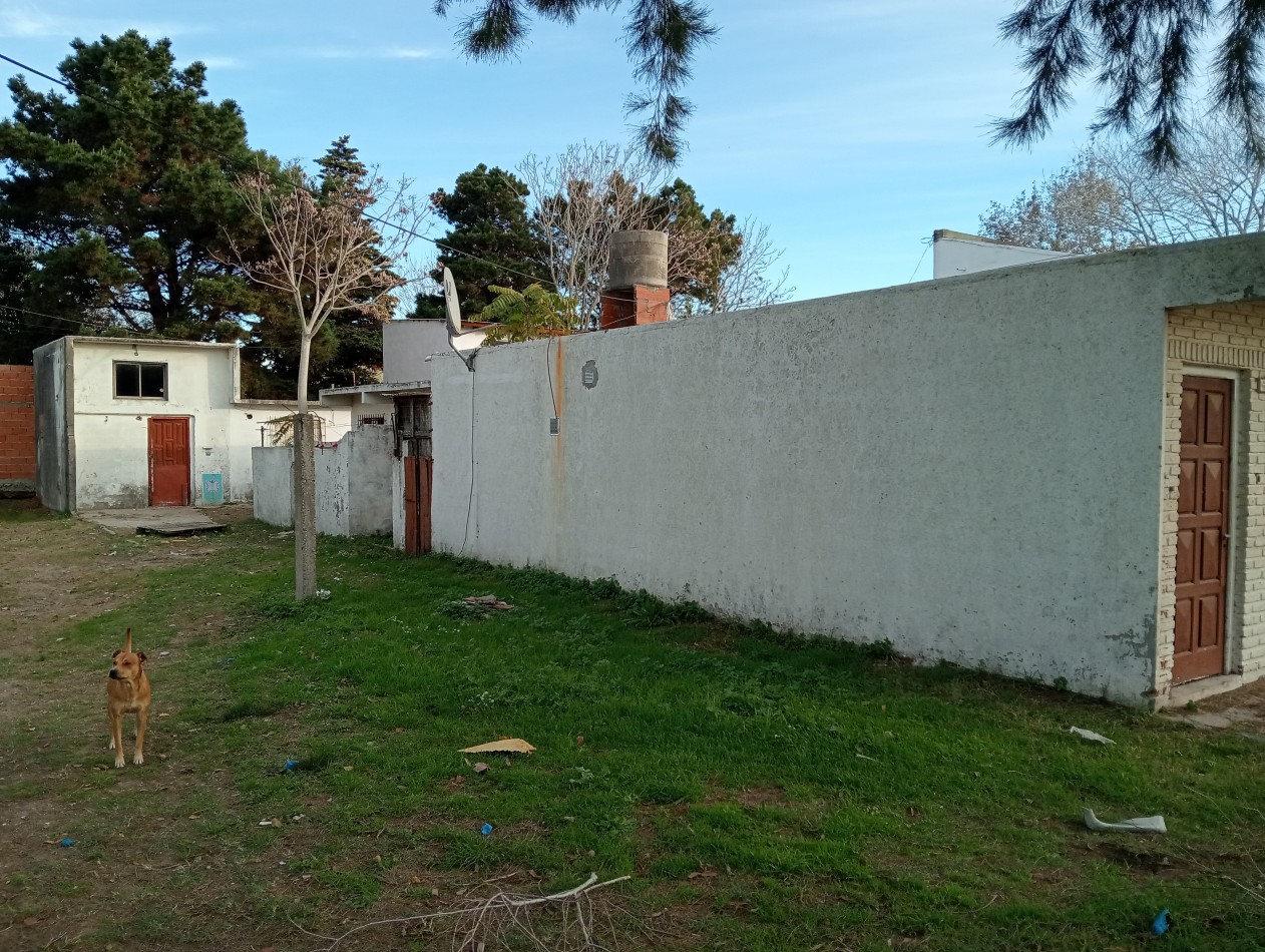 Casa, departamentos y lote a la venta 
